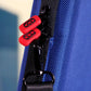 Close-up of Blue Comic Shell Graded Comic Travel case with red and black zipper pulls and shoulder strap hardware
