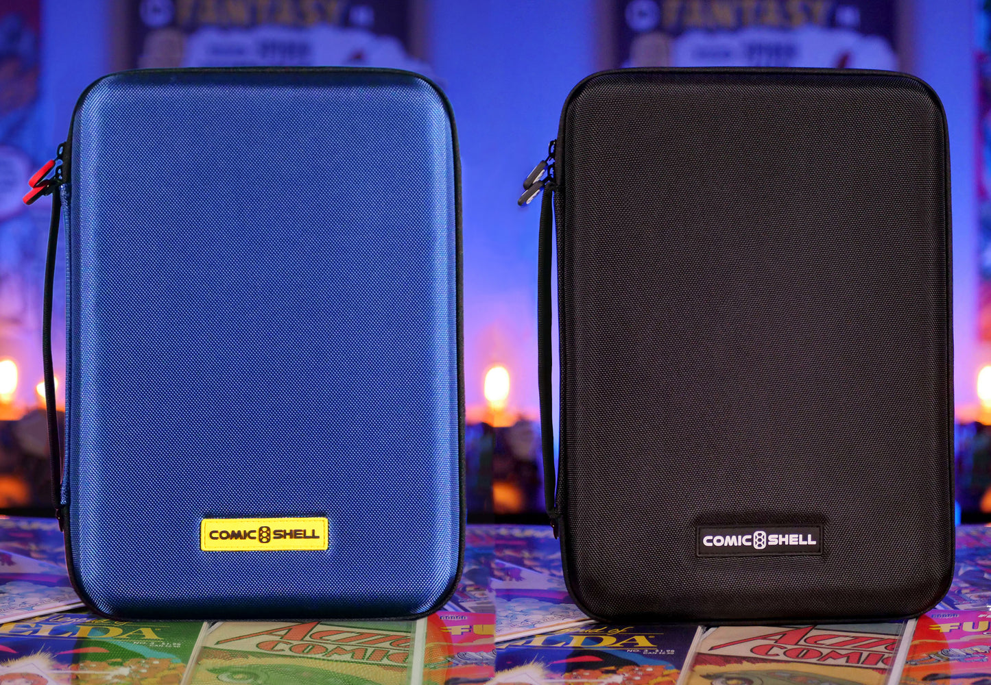 Two Comic Shell storage travel cases, one blue and one black, on a colorful surface 
