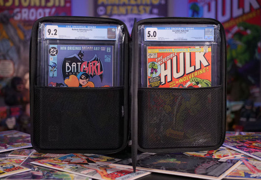 Two Comic Shell carrying cases with graded comic books displayed in front, set against a backdrop of various comic books and collectibles