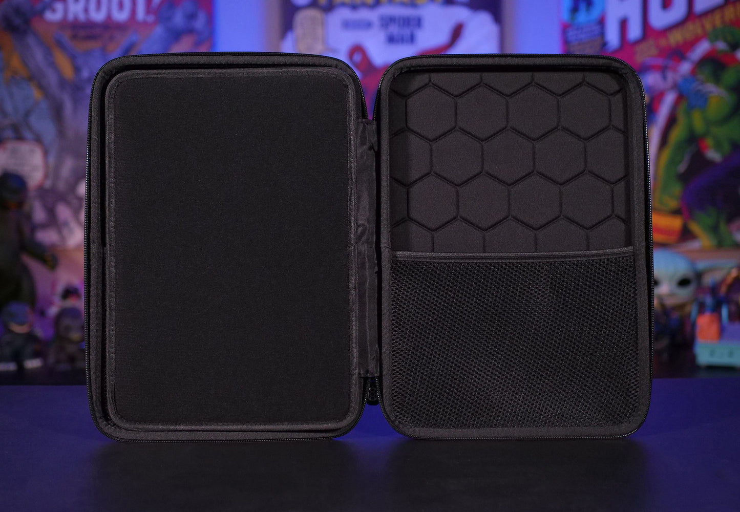 Open view of right side of Comic Shell showing hexagon padding pattern and center protective divider panel 